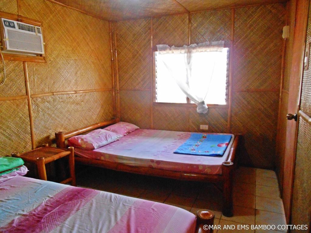 Pareja Tourist Inn Малапаскуа Айлънд Стая снимка