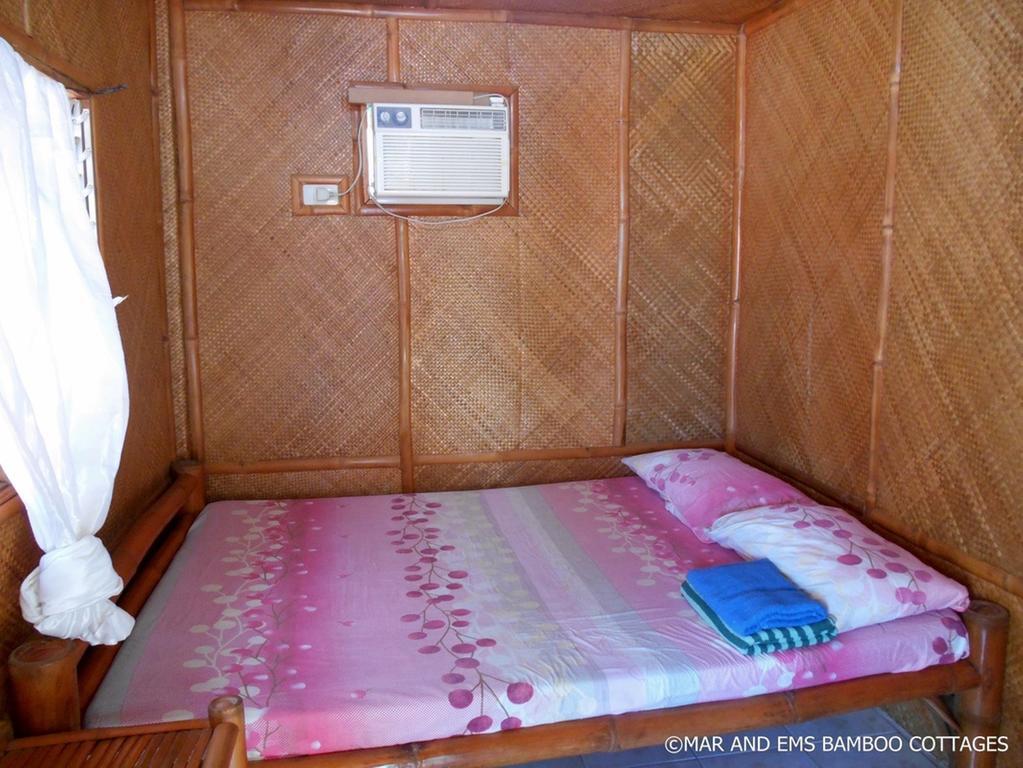 Pareja Tourist Inn Малапаскуа Айлънд Стая снимка